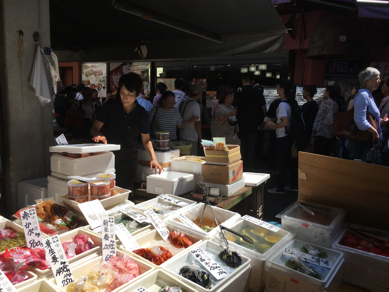 An outer market vender selling Japanese pickles.
